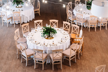 Guest table, with bouquet from petals and a number