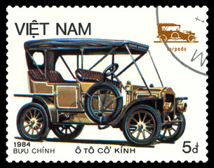 Fototapeta na wymiar Postage stamp. Old-time car Torpedo.
