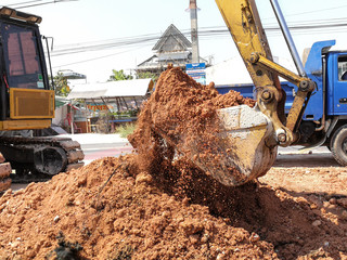 Loaders are working in the highway