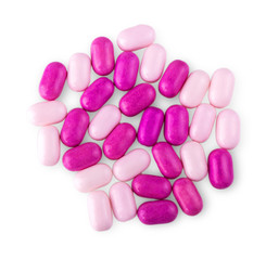 Obraz na płótnie Canvas Pile of multicolored pills on white background.