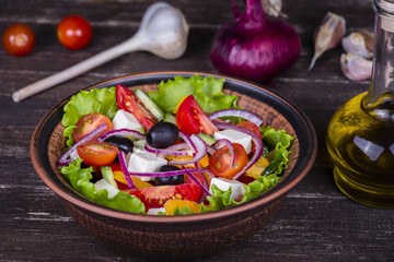 Fresh vegetable greek salad on the table