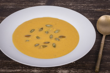 Apple pumpkin cream soup in a dish