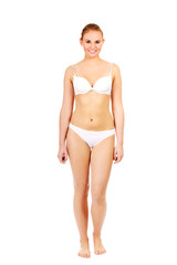 Young sporty woman in white underwear