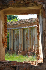 Structured bricks colonnades with blue sky summer background