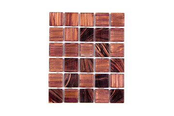 Fragment of a mosaic of small shiny tiles on white background 