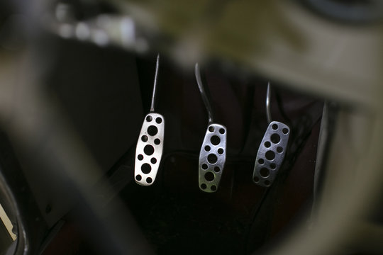 Pedals of a Classic car in a detail shotho