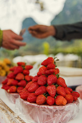 Stacks of strawberries in a local market in China.