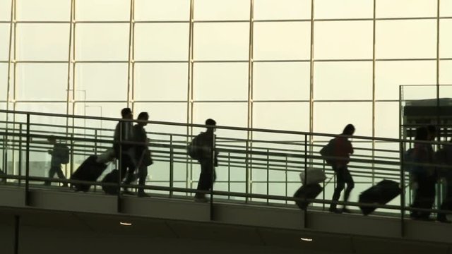Silhouettes of Travellers in Airport, HongKong.