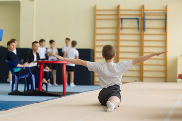 Fototapeta na wymiar GOMEL, BELARUS - 22 April 2017: Freestyle competitions among young men and women in 2004-2006. In the program trampoline and gymnastic path