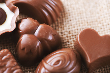 Horizontal close-up shot of chocolate candy placed on the canvas.