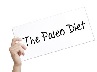 The Paleo Diet Sign on white paper. Man Hand Holding Paper with text. Isolated on white background