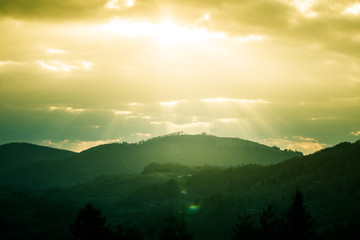A beautiful hillside scenery of Tatra mountains. Warm summer haze, colorful contrast look.