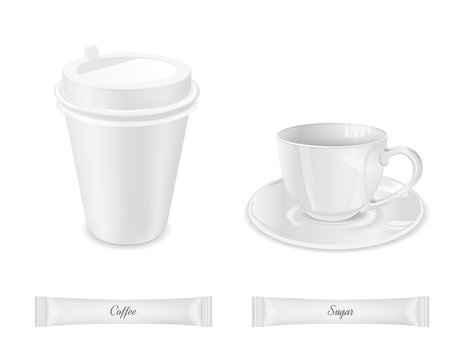 White disposable packaging for sugar and coffee. Glass cup with saucer and paper coffee cup