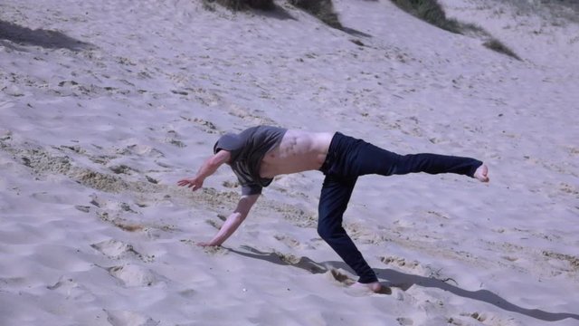 Wonthaggi, Australia: Boy Does a Cartwheel on the Beach, Slow Motion