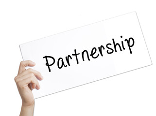 Partnership Sign on white paper. Man Hand Holding Paper with text. Isolated on white background