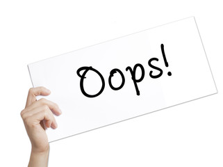 Oops! Sign on white paper. Man Hand Holding Paper with text. Isolated on white background