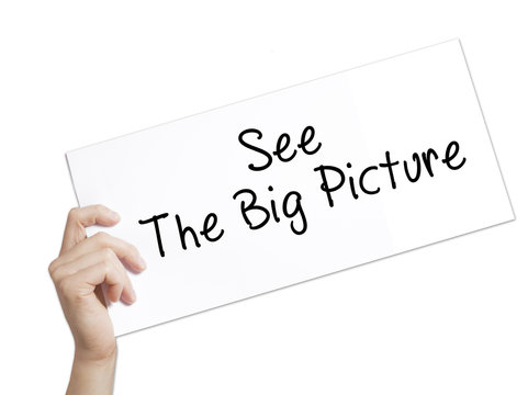 See The Big Picture Sign on white paper. Man Hand Holding Paper with text. Isolated on white background
