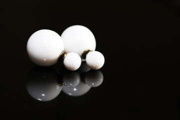 Beautiful earrings on a black background
