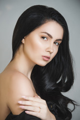 Naklejka premium Portrait of young and beautiful girl on background