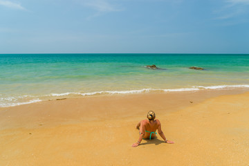 Fototapeta na wymiar Woman at the beach in Thailand