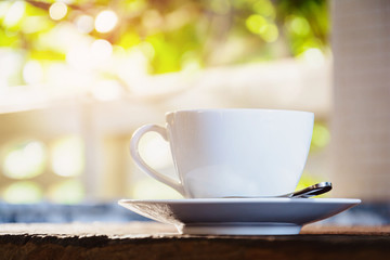 Coffee cup on old wooden table