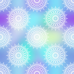 Ethnic boho seamless pattern. Mandala design in oriental style. Bokeh texture.
