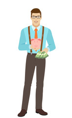 Businessman with cash money holding a piggy bank