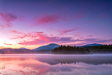 Early morning by the purple lake