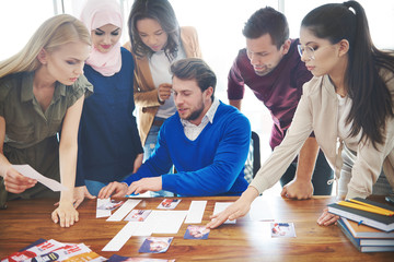 Group of young business people over meeting .