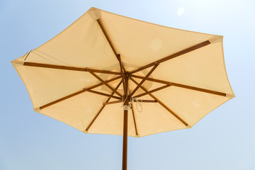 parasol over blue sky