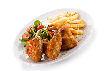 Fried chicken wings with french fries