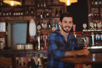Man having beer in pub