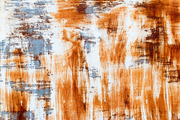 A background of peeling paint and rusty old metal