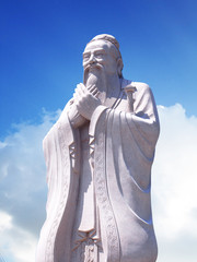 Confucius statue with sky background