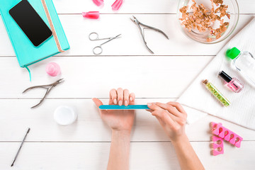 Woman Hands Care. Top View Of Beautiful Smooth Woman's Hands With Professional Nail Care Tools For...