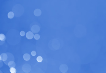 Winter elegant bokeh background. Seasonal cooling light decorative abstract design element.