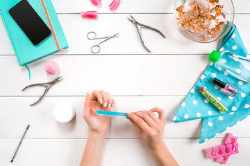 Woman Hands Care. Top View Of Beautiful Smooth Woman's Hands With Professional Nail Care Tools For...