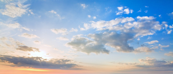 Sunrise sky panorama with clouds