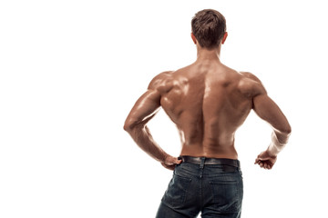 Strong Athletic Man Fitness Model posing back muscles, triceps over white background. Copy space