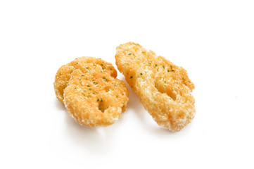 roasted bread bites isolated on white