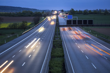 some highway traffic in the evening