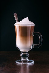 coffee latte macchiato on a black background