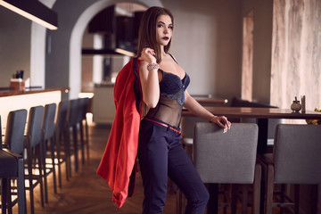 Gorgeous beauty young woman in interior