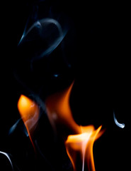 Close up view of natural flame with smoke