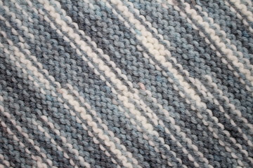 текстура вязаной ткани с абстрактным рисунка в серых тонах     