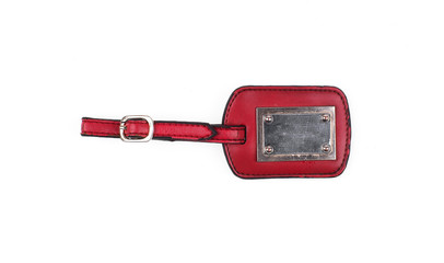 Red, leather tag from clothes on white background