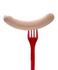 Sausage on a red fork on a white background