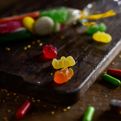 candies on a wooden chopping board