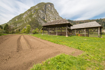 Traditional wooden double hayrack in Bohinj, Slovenia during spring time