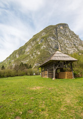 Fototapeta na wymiar Traditional wooden double hayrack in Bohinj, Slovenia during spring time